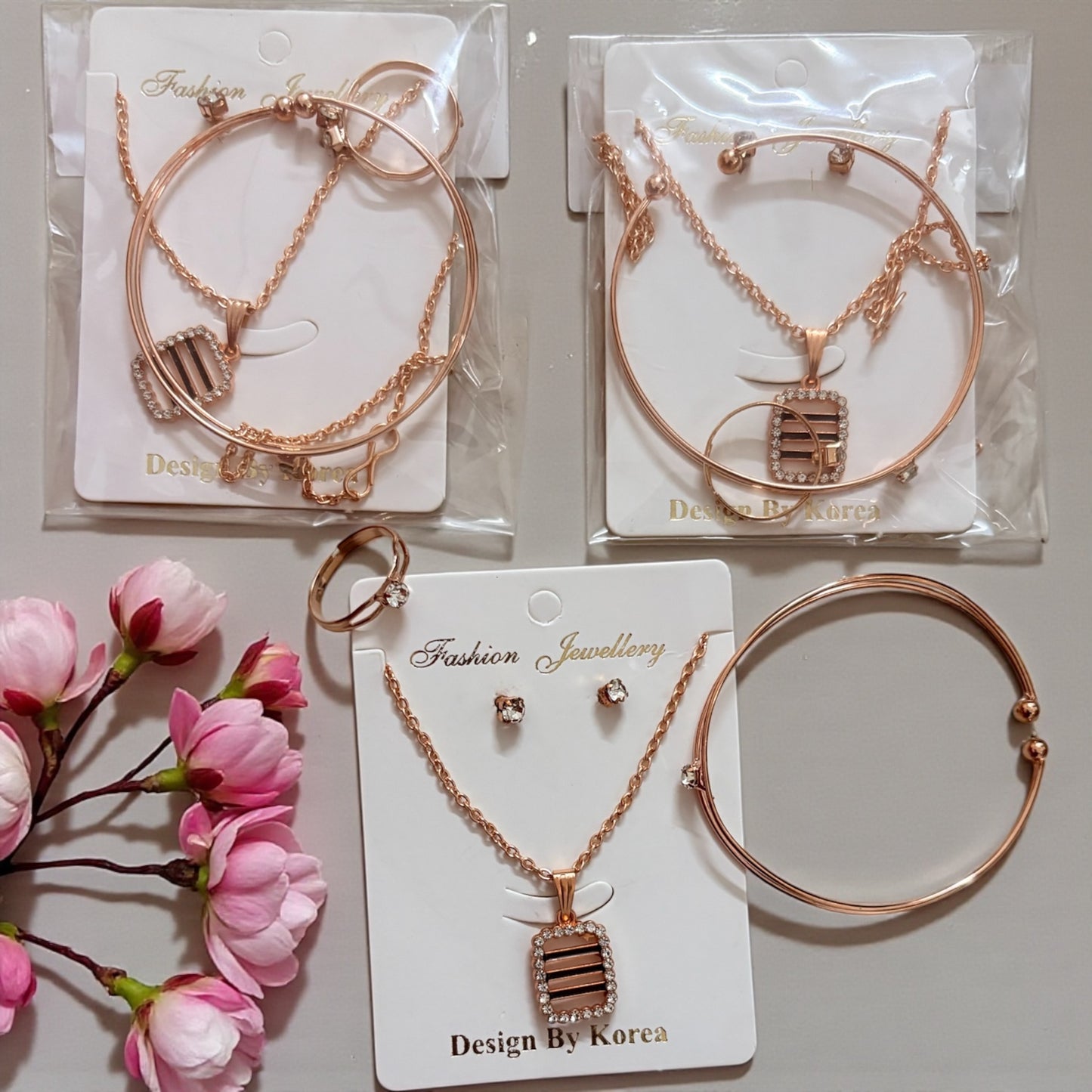 Rose Gold Chain Necklace, Earrings, Ring & Adjustable Bracelet Combo (Pack of 3)