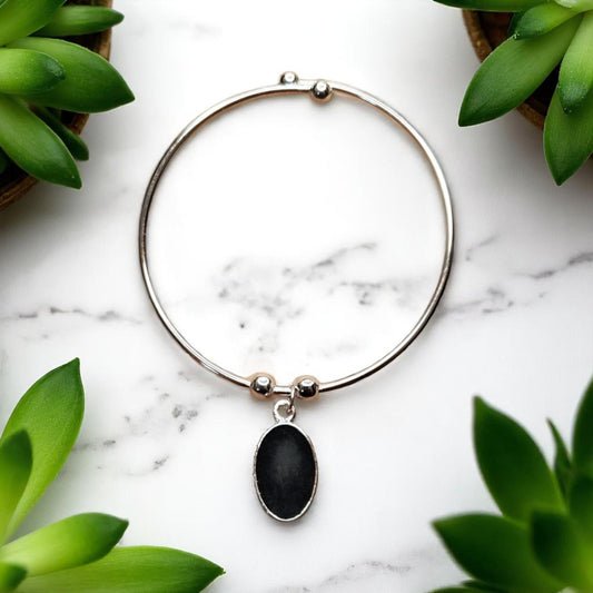 Fancy Stone Bracelet with Black Oval Charm